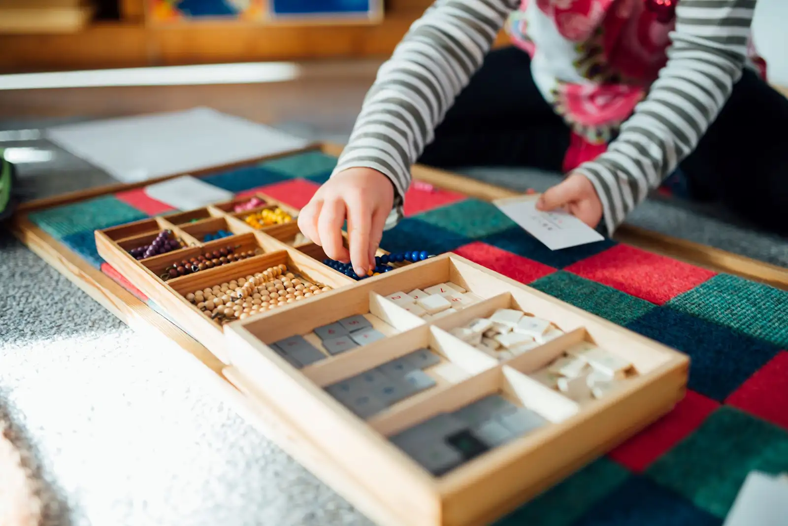 Child in Montessori classroom